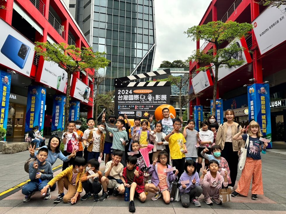 A group of students pose for a picture before heading towards a TICFF screening